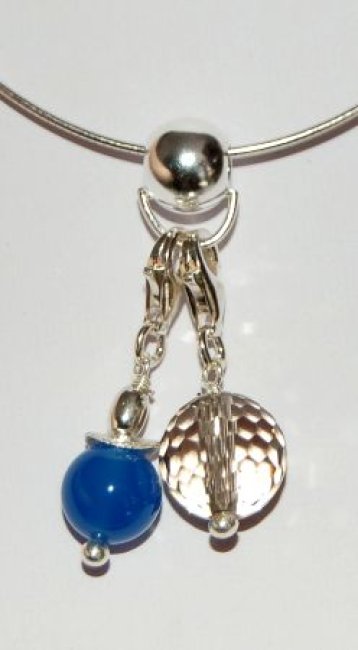 Charmträger in Kugelform